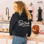 unisex blue navy sweater in a coffee shop