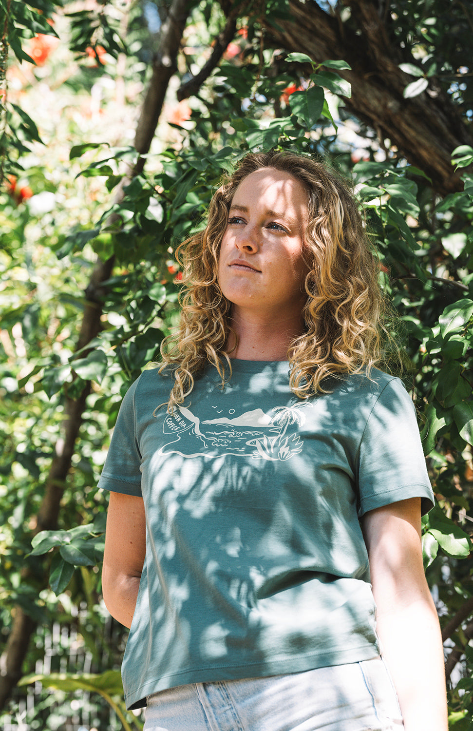 Girl with a green lava java t shirt relaxed fit