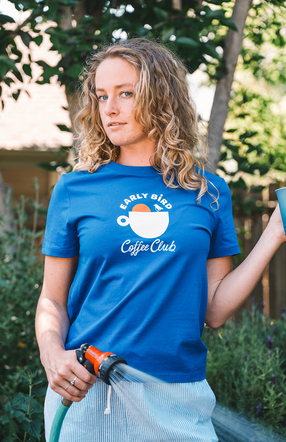 Blue t shirt for women early bird coffee club. Buen dia coffee